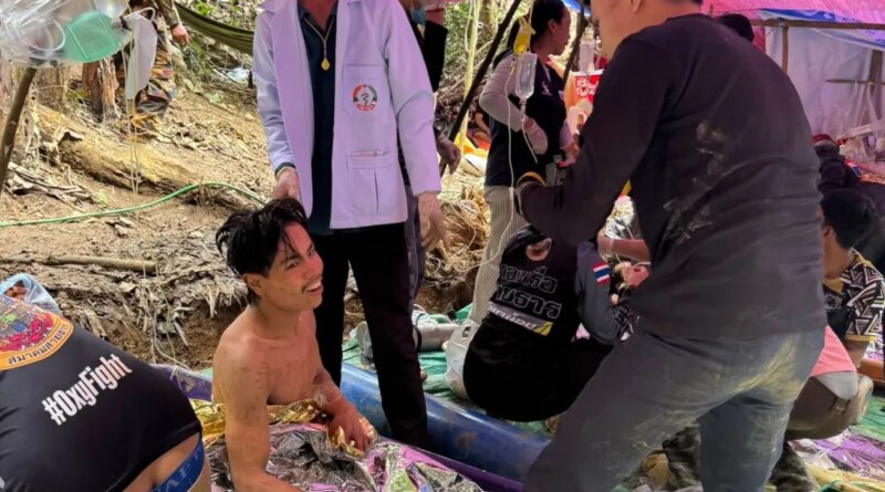 Rescuers free four more men from flooded Laos cave, two still missing