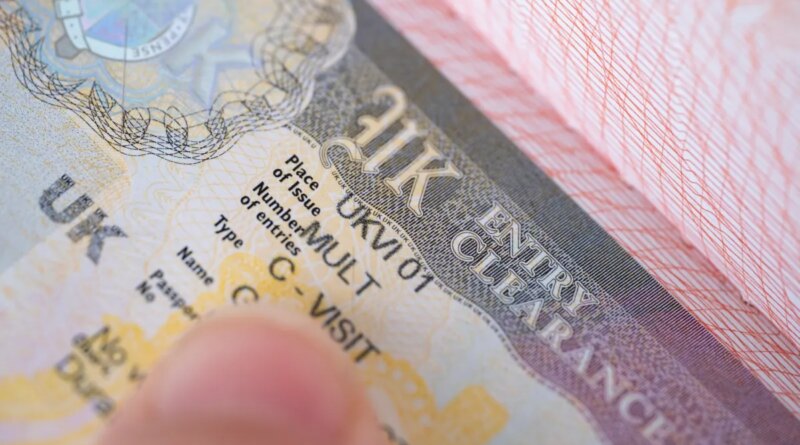 a close-up shot of a UK visa in someone's passport.