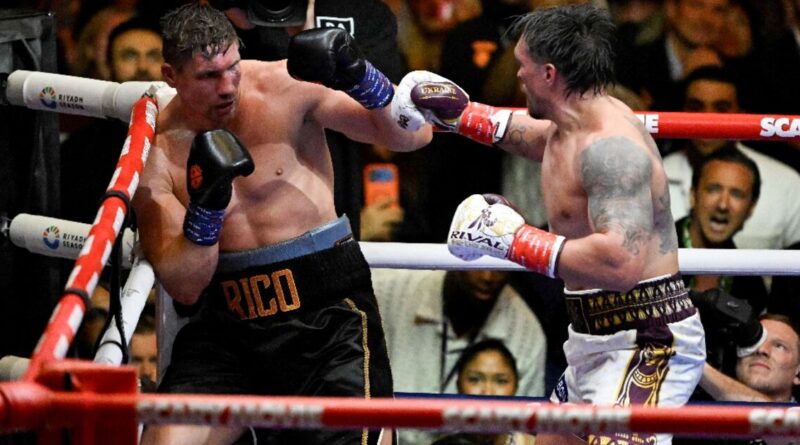 Usyk rocked before stopping Verhoeven to retain heavyweight belts