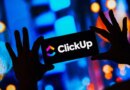 ClickUp logo on a smartphone
