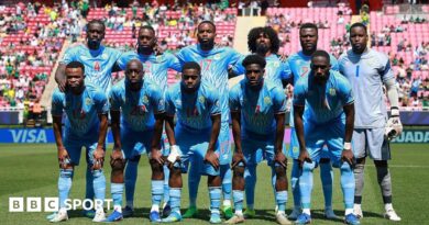 The DR Congo team pose for a photo before a game