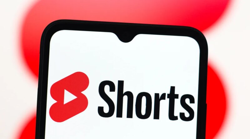 In this photo illustration, the YouTube Shorts logo is seen displayed on a smartphone screen.
