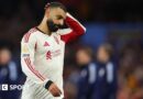 Referee Michael Salisbury signals before he awards a second goal to Matheus Cunha of Manchester United after a VAR check 