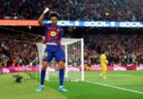 Barcelona's Lamine Yamal celebrates scoring their third goal in the La Liga match against Espanyol