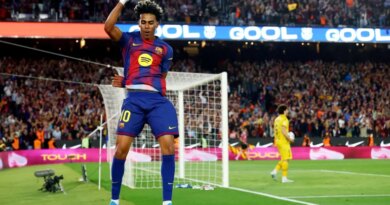 Barcelona's Lamine Yamal celebrates scoring their third goal in the La Liga match against Espanyol