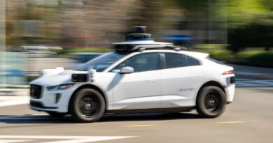 A Waymo autonomous taxi outside the Google headquarters