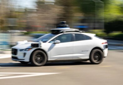 A Waymo autonomous taxi outside the Google headquarters