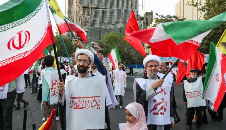 TEHRAN, IRAN - JUNE 12: People from Tehran province gather in support and allegiance to Iranian Supreme Leader Mojtaba Khamenei, while holding Iranian flags and images of both the new and former leaders of Iran, on June 12, 2026 at Palestine Square in Tehran, Iran. (Photo by Majid Saeedi/Getty Images)