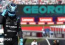 George Russell celebrates after claiming pole position in Austria 