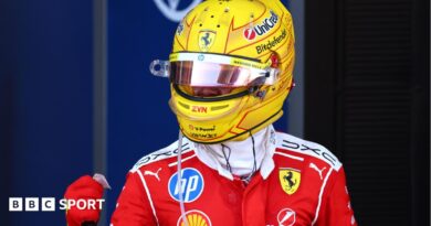 Ferrari's Lewis Hamilton clenches his fist in celebration after winning the Barcelona-Catalunya Grand Prix
