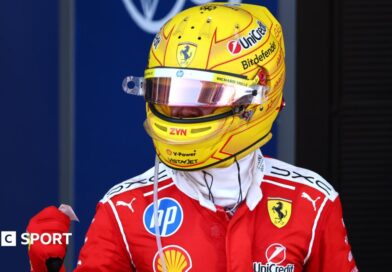 Ferrari's Lewis Hamilton clenches his fist in celebration after winning the Barcelona-Catalunya Grand Prix