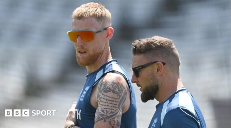 Ben Stokes raises his arms to celebrate a wicket