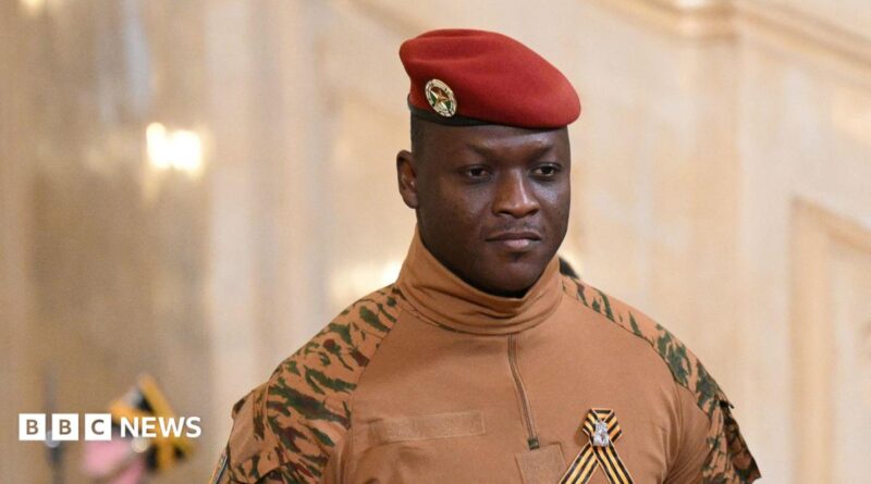 Burkina Faso's military leader Ibrahim Traore wearing a military uniform with a red hat