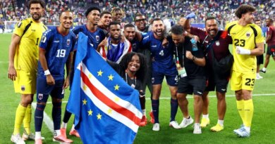 Cape Verde players and staff celebrate after the Saudi Arabia match match as Cape Verde qualify for the knockout stages of the World Cup