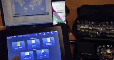 An engineer shows devices and explains the technology developed by the Israeli firm Cellebrite.