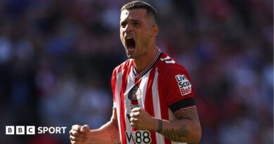 Granit Xhaka does a double fist pump celebrating a Sunderland win