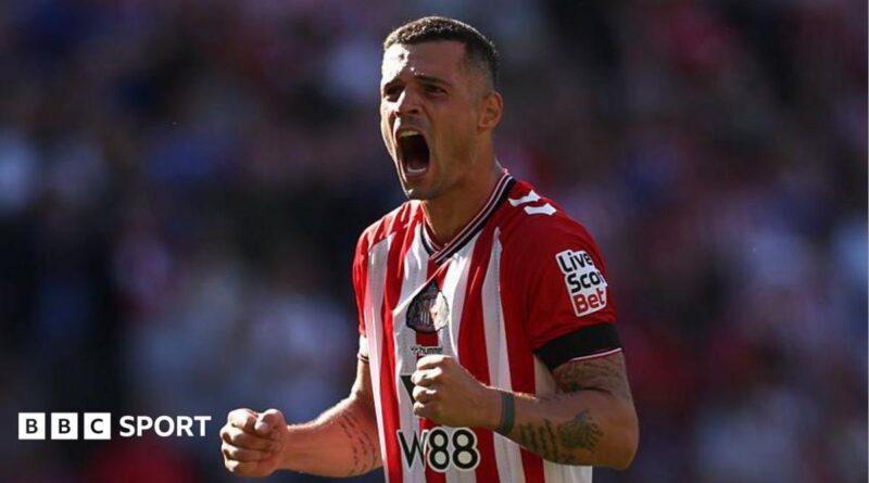 Granit Xhaka does a double fist pump celebrating a Sunderland win