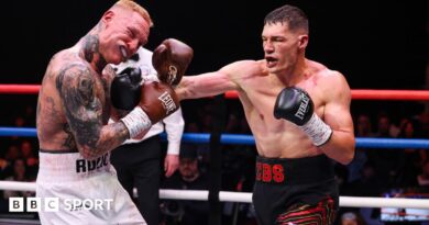 Chris Billam-Smith and Ryan Rozicki trade blows in the ring