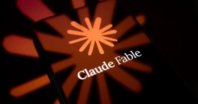 The Claude Fable logo is displayed on the screen of a smartphone placed on a reflective surface onto which the company's icon is projected.