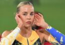 Keely Hodgkinson poses on a throne after breaking the world indoor 800m record