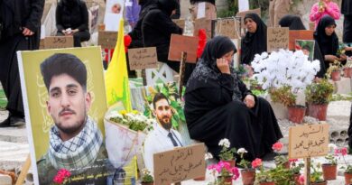 Displaced families bury Hezbollah dead in temporary graves