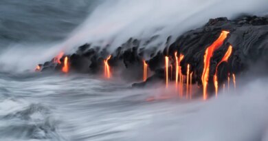 Lava pours into the ocean.