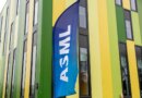 A banner flag with the ASML logo outside the Brainport Industries Campus, which houses the ASML Academy, in Eindhoven, Netherlands.
