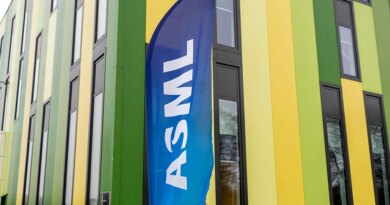 A banner flag with the ASML logo outside the Brainport Industries Campus, which houses the ASML Academy, in Eindhoven, Netherlands.