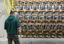 A man works on Pacific Fusion's pulser prototype.