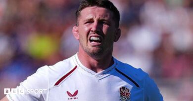 Harry Randall, Marcus Smith and Seb Atkinson hug