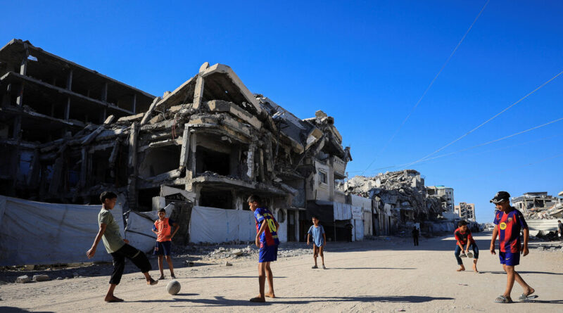 Gazans displaced by war watch World Cup from the ruins