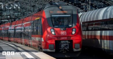 A DB Deutsche Bahn passenger train is seen at the Berlin Hauptbahnhof main railway station in Berlin.