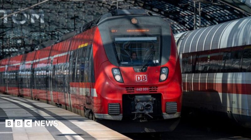 A DB Deutsche Bahn passenger train is seen at the Berlin Hauptbahnhof main railway station in Berlin.