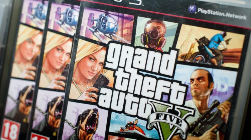 Close view of the packaging of the console game Grand Theft Auto 5.