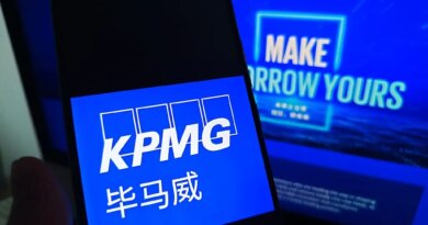 SUQIAN, CHINA - MAY 19, 2026 - A netizen is checking KPMG logo on his mobile phone and KPMG webpage on his computer in Suqian City, Jiangsu Province, China on May 19, 2026. (Photo credit should read CFOTO/Future Publishing via Getty Images)