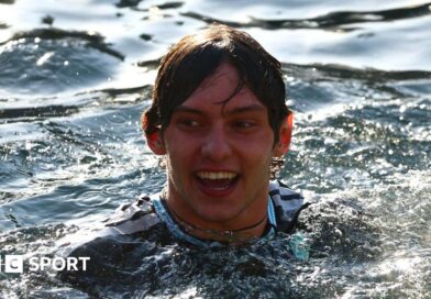 Race winner Kimi Antonelli swimming in the Monaco harbour after winning the grand prix