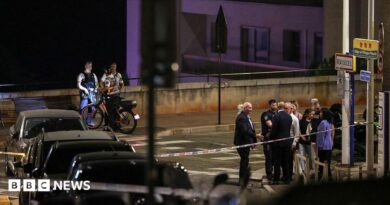 Police near the scene of the blast late at night on a Monaco street
