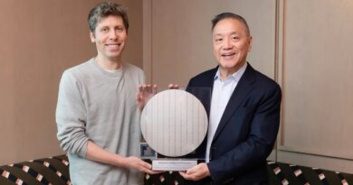 The CEOs of OpenAI and Broadcom stand flanking a circular semiconductor wafer.