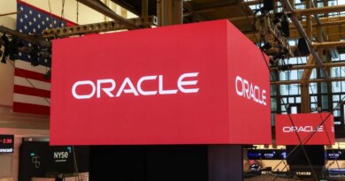 Oracle Corp. signage on the floor of the New York Stock Exchange (NYSE) in New York, US, on Friday, April 10, 2026.
