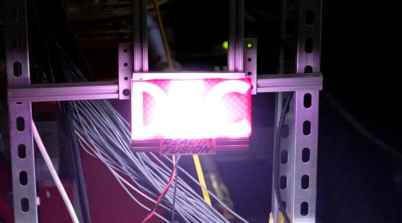 A sign that says DEC is lit with purple backlighting.