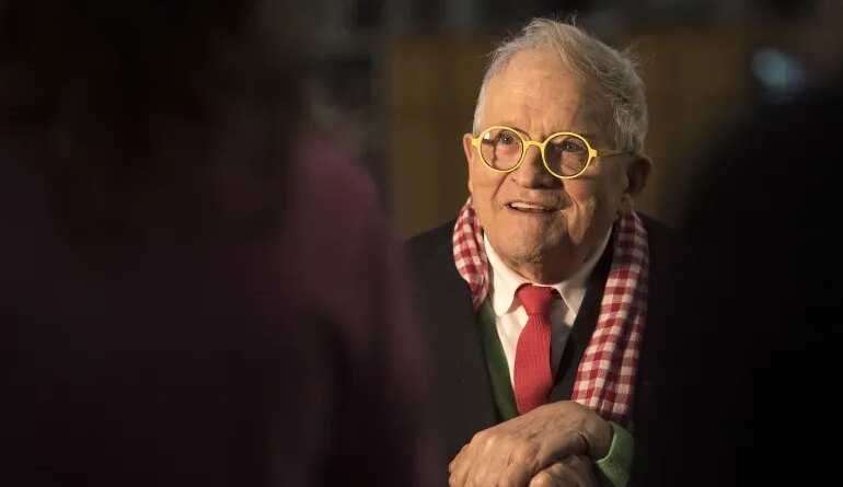 (FILES) British artist David Hockney gestures during a preview of The Queen's Window, a new stained glass window designed by Hockney and created by Barley Studio York, at Westminster Abbey in central London on September 26, 2018.