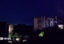 Residential buildings at night during a temporary power outage, which local authorities said was caused by technological disturbances in the peninsula’s energy grid
