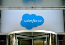 Close-up view of the logo at the entrance to the Salesforce office located at 111 West Illinois Street in Chicago, Illinois, January 2019.