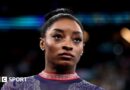 A close up of Simone Biles' face prior to competing in the artistic gymnastics Women's floor exercise final at the 2024 Olympics