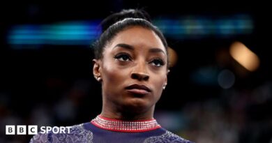 A close up of Simone Biles' face prior to competing in the artistic gymnastics Women's floor exercise final at the 2024 Olympics