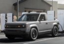 Slate Auto's Blank Slate truck charging at a Tesla Supercharger