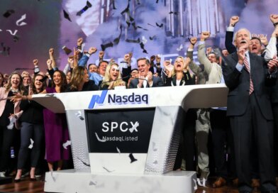 Bret Johnsen (C), SpaceX Chief Financial Officer, and Gwynne Shotwell (center R), SpaceX President and Chief Operating Officer, celebrate as they ring the opening bell at the Nasdaq MarketSite to celebrate the launch of SpaceX’s initial public offering (IPO) in New York on June 12, 2026.