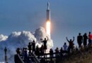 The crowd cheers at Playalinda Beach in the Canaveral National Seashore, just north of the Kennedy Space Center, during the launch of the SpaceX Falcon Heavy rocket, on Feb. 6, 2018. Playalinda is one of closest public viewing spots to see the launch, about 3 miles from the SpaceX launchpad 39-A. (Joe Burbank/Orlando Sentinel/Tribune News Service via Getty Images)