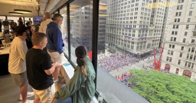 The hottest office perk in NYC today: a front-row view of the Knicks parade