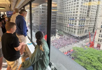 The hottest office perk in NYC today: a front-row view of the Knicks parade